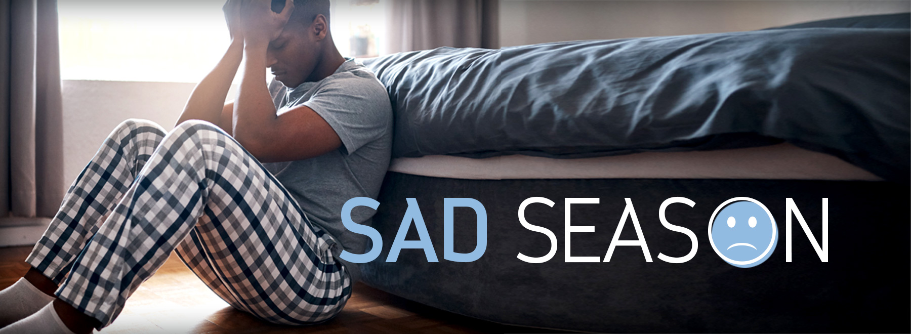 Man sitting by bed depressed with title Sad Season